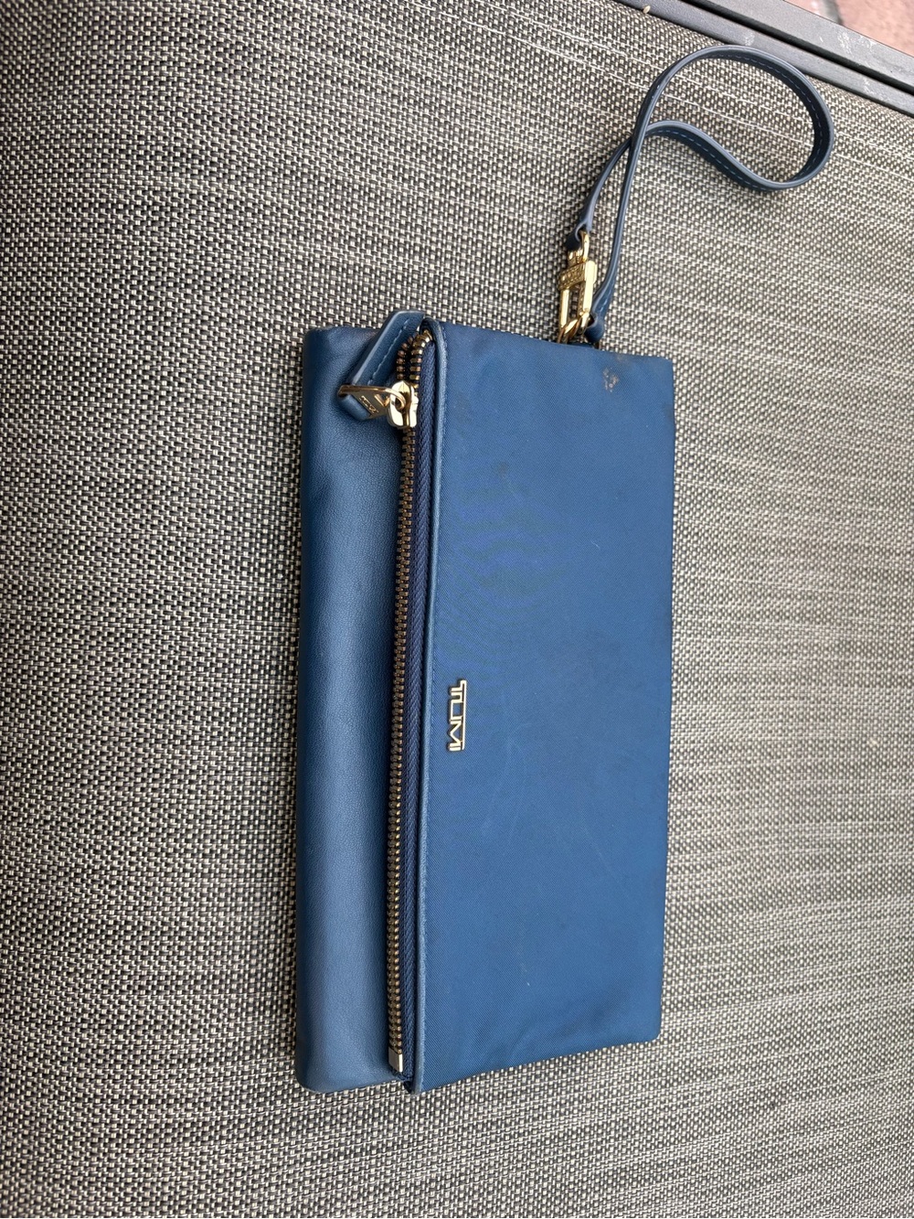 Tumi Navy Blue Leather Wristlet Clutch with Gold Hardware